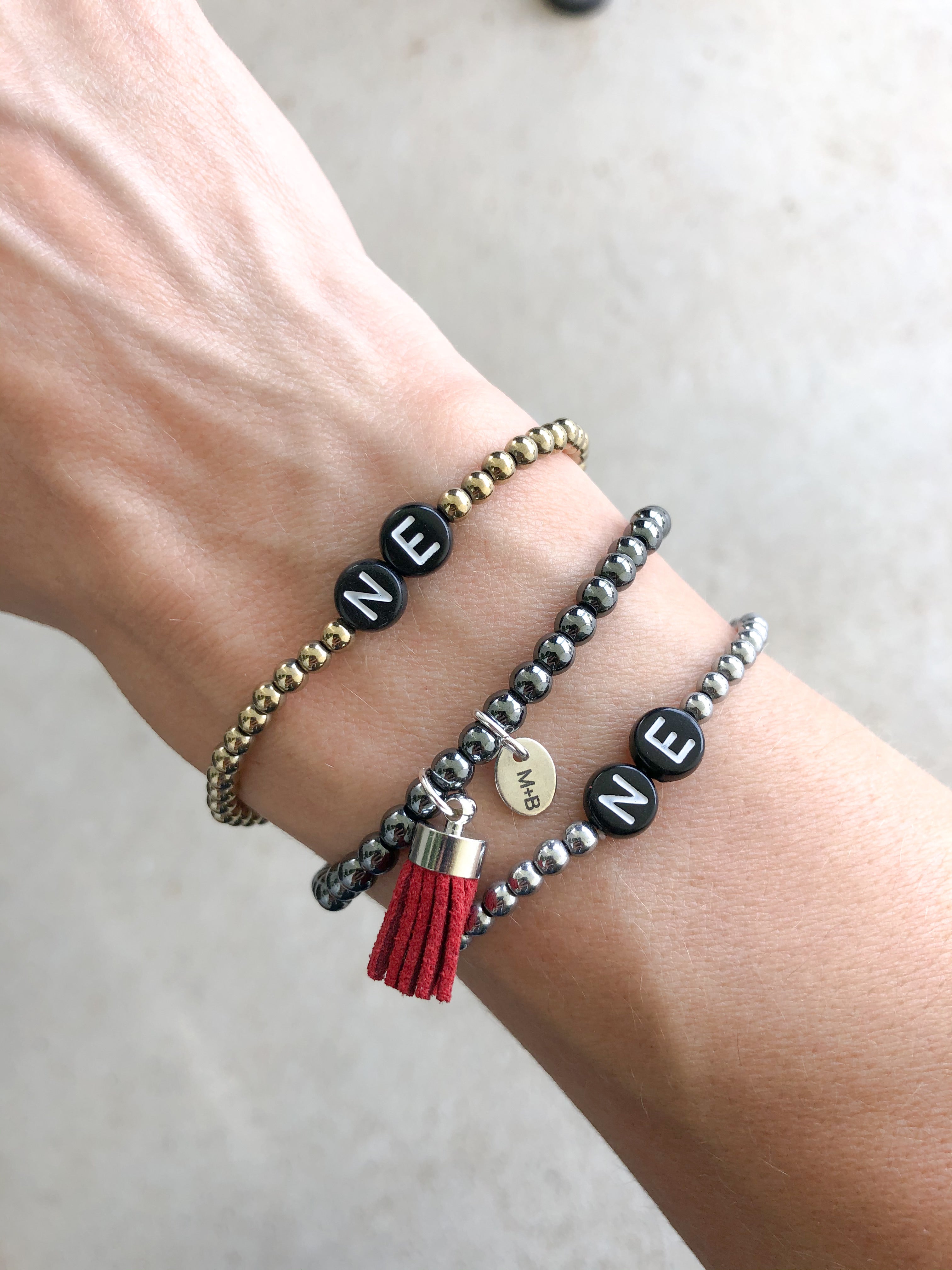 Ne Mini Tassel